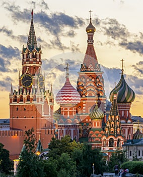 Cathedral of Vasily the Blessed and Spasskaya Tower of Moscow Kremlin on Red Square at sunset, Moscow,