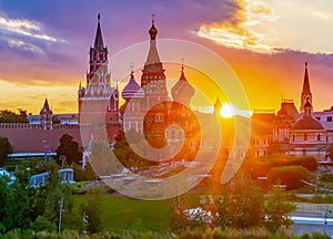 Cathedral of Vasily the Blessed and towers of Moscow Kremlin on Red Square at sunset, Moscow, Russia