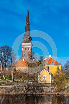 Cathedral in Vasteras viewed behind river Svartan, Sweden