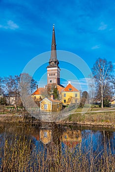 Cathedral in Vasteras viewed behind river Svartan, Sweden