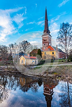 Cathedral in Vasteras viewed behind river Svartan, Sweden
