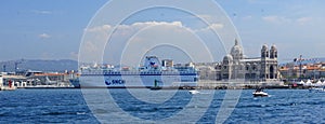 Cathedrale La Major and cruise ship in port of Marseille