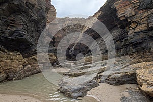 Cathedrals beach Playa de las Catedrales, amazing landscape with rocks on the Atlantic coast, Spain. Outdoor travel background