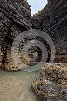 Cathedrals beach Playa de las Catedrales, amazing landscape with rocks on the Atlantic coast, Spain. Outdoor travel background