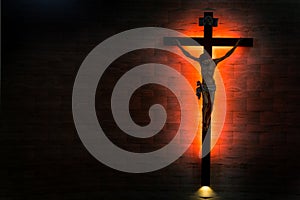 Catholic Christian Crucifix in silhouette flushed right. photo