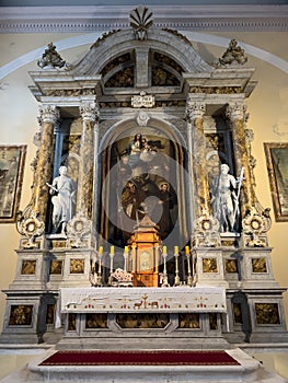 Catholic church altar with icons, statues and columns