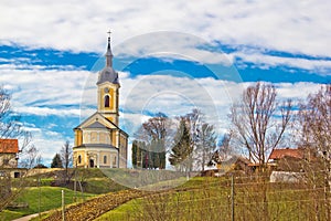 Catholic church on idyllic village hill