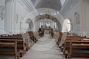 catholic church interier in white decorated walls