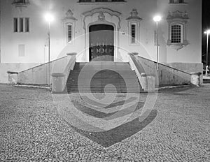 Catholic church staircase with black and white photo in the interior of Brazil, South America