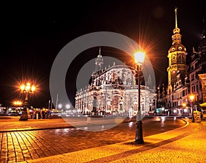 Catholic Court Church Katholische Hofkirche in the center of old town in Dresden in evening on lamps light