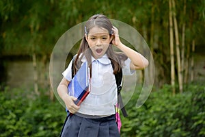 Catholic Female Student Under Stress With Books