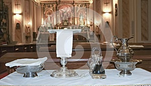Catholic liturgical object. Chalice, communion wafers, wine, water, ewer and basin
