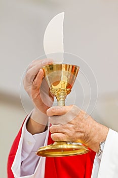 Catholic Mass - holly sacrifice of blood and body of Jesus Christ photo