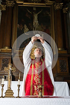 Consecration during catholic mass photo