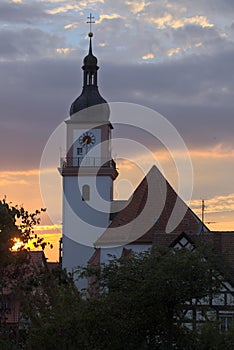 Catholic parish church St. Johann Baptist in Hilpoltstein, Germany in evening light