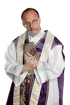 Catholic Priest with Bible in church photo