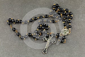 Catholic rosary beads. black rosary close-up