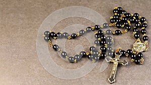 Catholic rosary beads. black rosary close-up