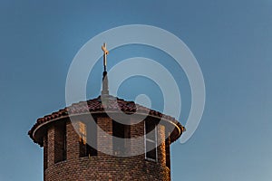 Catholics Cross on steeple photo