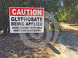 Cation Glyphosate being applied sign