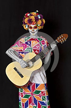 Catrina makeup. Young Mexican woman with typical costume