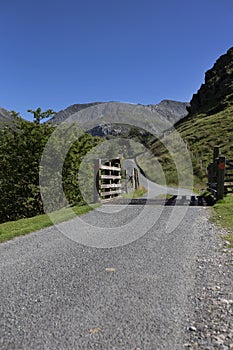 Cattle grid on a rural road in the Nant Ffrancon Valley part of the Snowdonia National Park, North Wales.