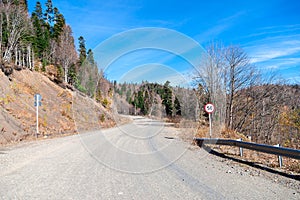 Caucas Mountains. Bend in the road with roadsign