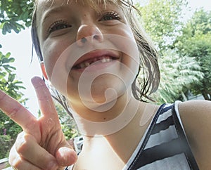 Caucasain girl smiling to camera photo