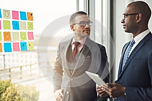 Caucasian and African businessman in a meeting