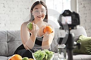 Caucasian blogger woman make vlog how to diet and lost weight. Lifestyle, influencer women, healthy concept.