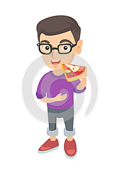 Caucasian boy in glasses eating tasty pizza.