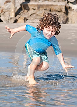 Caucasian boy playing