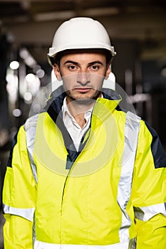 Caucasian business people in hard hat or safety wear. Professional male industry engineer specialist. Portrait of a