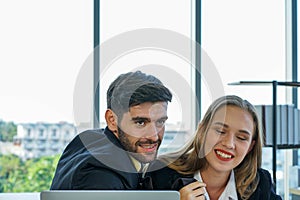 Caucasian business woman meeting with colleague in the office