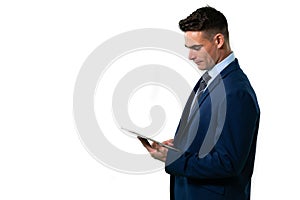 Caucasian businessman holding a tablet computer on white background