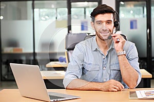 Caucasian businessman IT operator answering online phone call from customer as 24/7 customer service