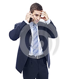 Caucasian businessman talking on cellphone