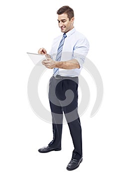 Caucasian businessman using tablet computer