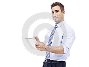 Caucasian businessman using tablet computer