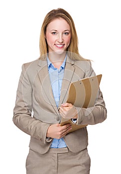 Caucasian businesswoman with clipboard