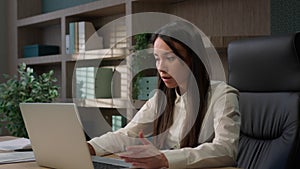 Caucasian businesswoman in office computer error crash business woman girl female worker sit at desk work on laptop