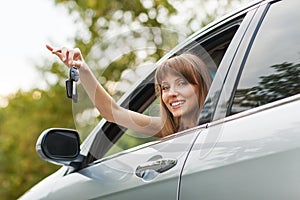 Caucasian car driver woman smiling