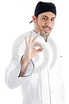 Caucasian chef showing okay hand gesture photo