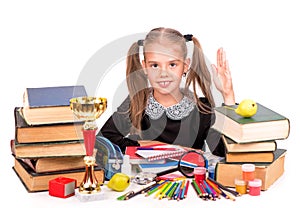 Caucasian child girl with school supplies stationary isolated on white background.