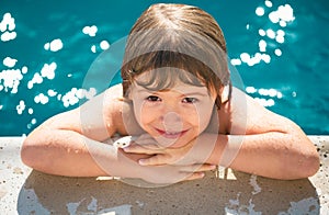 Caucasian child in swimming pool portrait close up. Kids face. Kids summer activities.