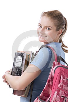 Caucasian college student with backpack copybooks