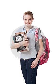 Caucasian college student with backpack notebooks