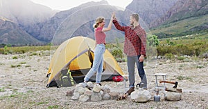 Caucasian couple camping in nature