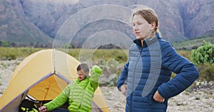 Caucasian couple camping in nature