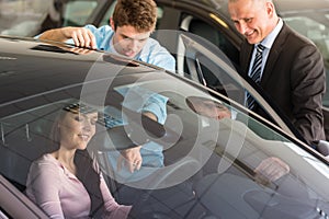 Caucasian couple choosing car